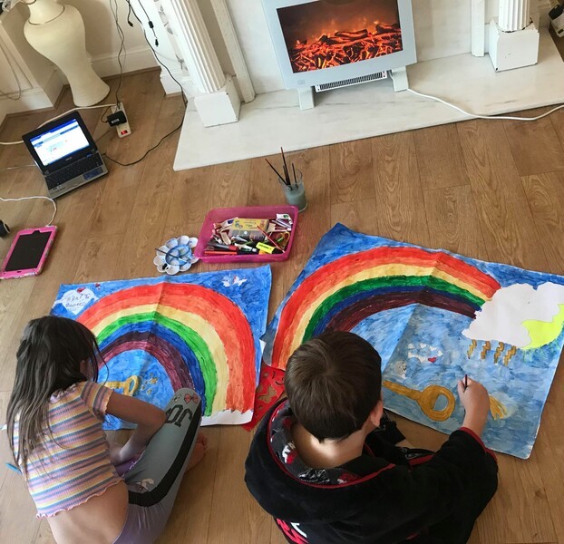 Kids drawing rainbows 