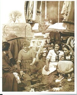 Gypsy women around a cooking fire