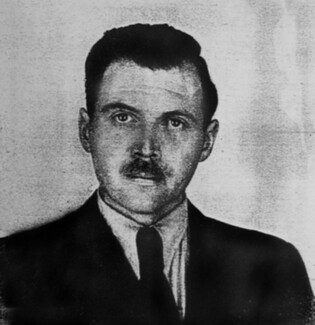 Photograph from Mengele's Argentine identification document (1956): By anonymous photographer - Public Domain, https://commons.wikimedia.org/w/index.php?curid=16473410