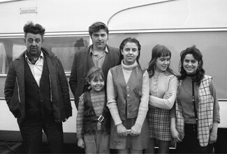 Father and son, young girl, two teenagers and young woman.  Early 1971. Barnsley. South Yorkshire. © KIERON FARROW. 