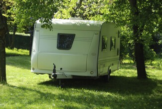 caravan under tree