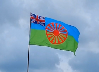 Billy Welch on the Romani flag