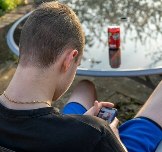 Boy with phone, stock image