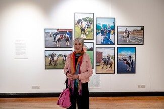 Cath Muldowney pictured alongside a selection of her photos in the gallery