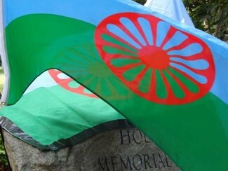 Romani Flags at the Holocaust Memorial Gardens, Hyde Park, London, on August 2nd, 2016, for Roma Holocaust Remembrance Day © free please credit TT/Mike Doherty
