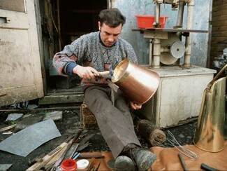 The decline of tin smithing, one of many traditional trades associated with Travellers 