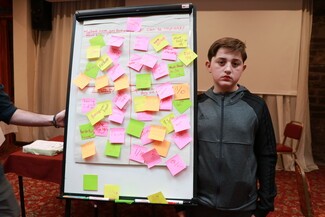 Tom Berry hoping to be elected for Welsh Youth Parliament standing by the evaluation framework he helped create to get young peoples feedback about the forum