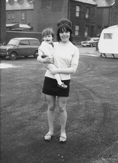 Teenager and child. 1971. Barnsley. South Yorkshire. © KIERON FARROW.