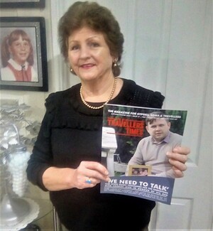 Betty Billington, Chair of campaign charity Kushti Bok and winner of the FFT Susan Alexander Lifetime Achievement Award, holds up her copy of the TT Autumn Magazine!