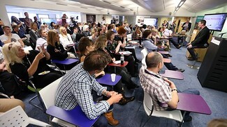 Room full of people at a conference