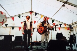 Chris Smith (stage name - Walter Brick) and Les Scarrott (stage name - Lez Shed) as Brickshed at Upton-upon-Severn Folk Festival-early 1990’s