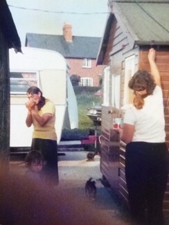 Chris Smith's mam Elizabeth (Betty) Smith (lighting a cigarette) and his sister Mary Haines (painting the shed) Yarkhill Farm