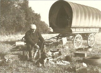 Man working outside his Vardo