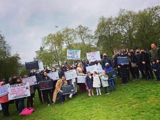 Wolfgang Douglas has been fighting for his father’s release since he was detained – here Wolfgang (kneeling, front) is pictured at a Free Albert rally in Parliament Square, London
