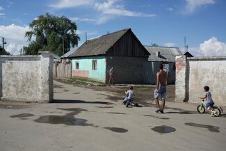 The Roma-only settlement in Beregovo. Separated from the rest of the town by a segregation wall, most of the homes have no access to running water or electricity © Alex Sturrock