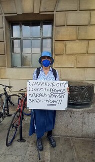 Protester with placard. Credit GRT Solidarity Network