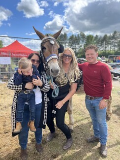 Best at Appleby winner Malcolm the mule with handlers Emily, Ben, Kate and Jerry