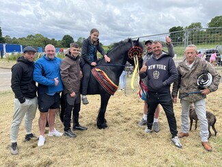 People's Champion and Best at Appleby winner Raven with owner Karl and family