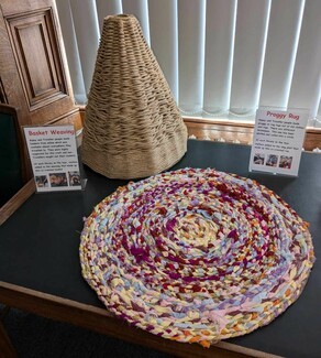 A proggy rug and basket on show in the Libraries Roadshow. Photograph by Gemma Lees