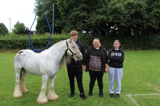  A Vision for Change. The Hughes family with their pony