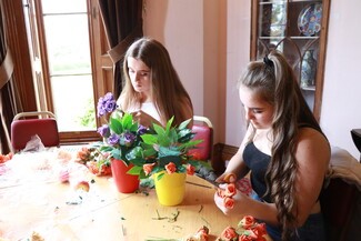 Girls making flowers 